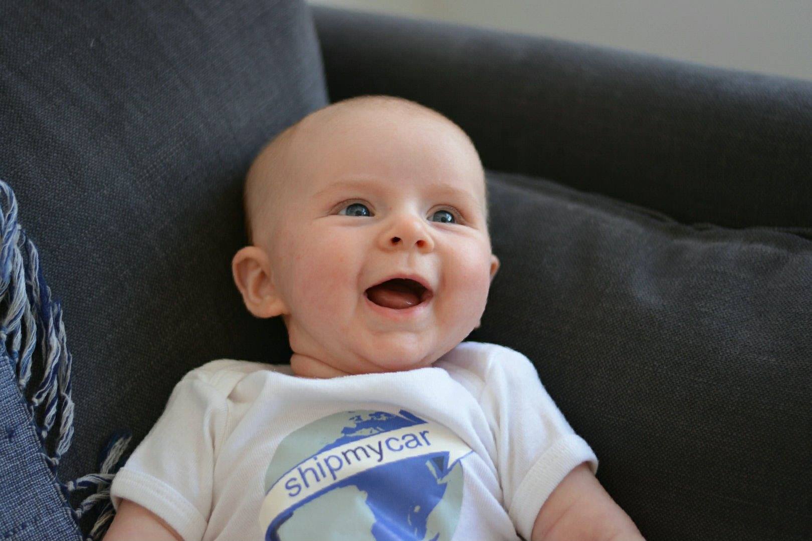 Director's new baby in ShipMyCar branded clothing