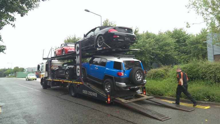 Multi-car transporter delivering to ShipMyCar 2