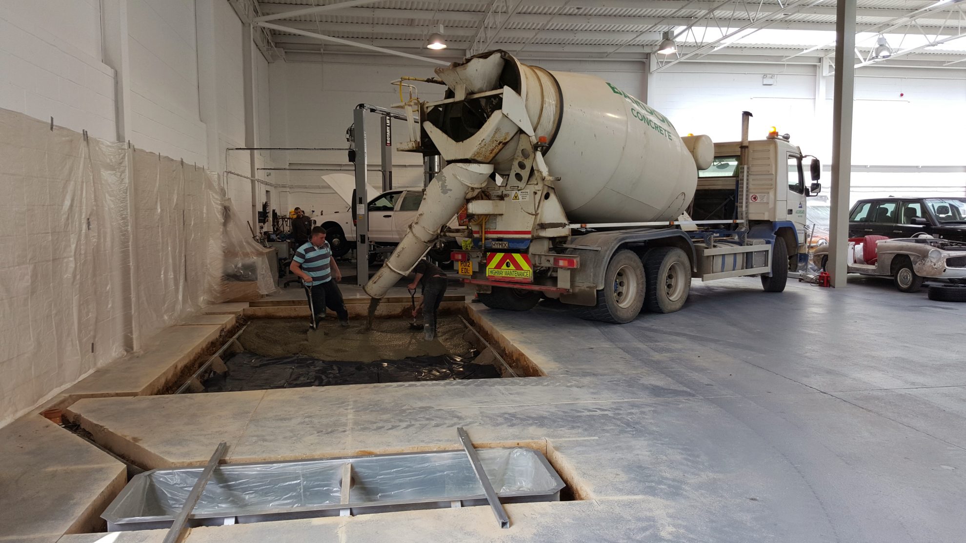 Digging up the workshop floor for MOT bay installation