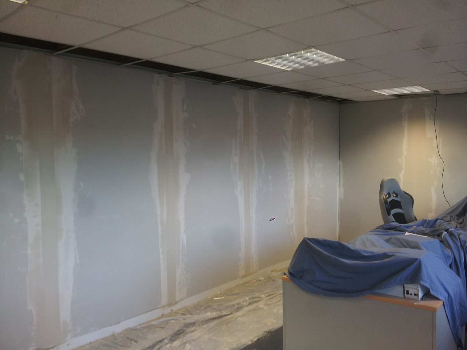 Plasterboarding the new office walls