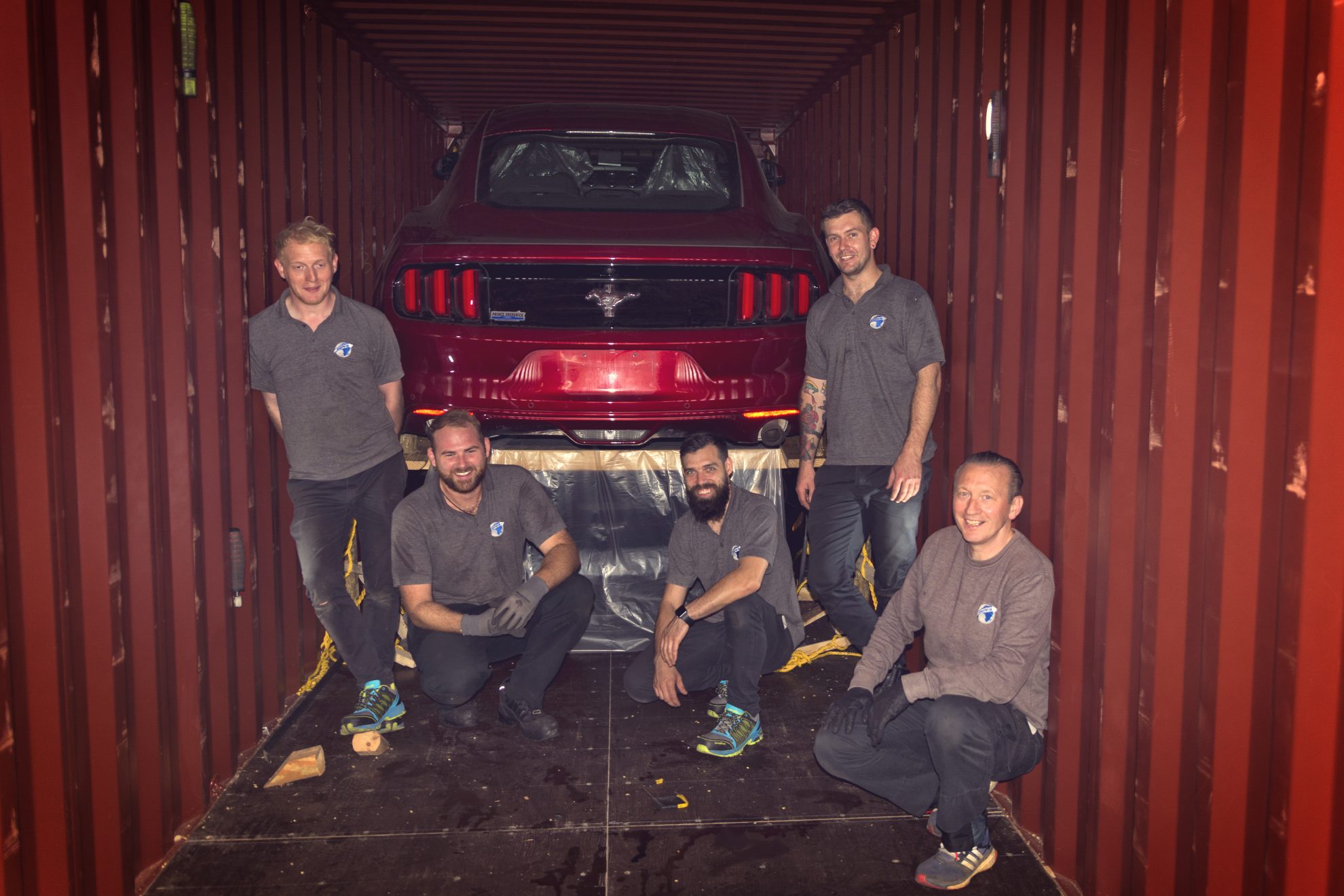 ShipMyCar team with Devan offering container unloading training