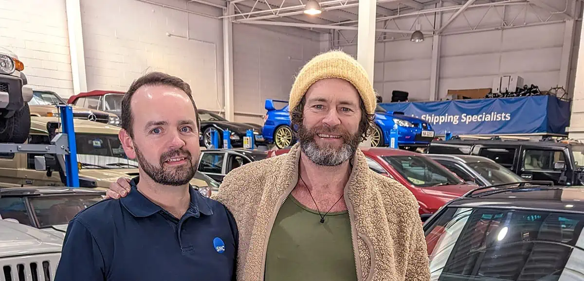 Luxury car being carefully loaded for celebrity shipping by ShipMyCar.