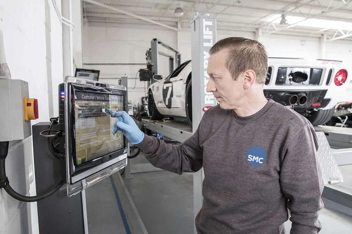 Technician conducting an MOT test at ShipMyCar's facility.