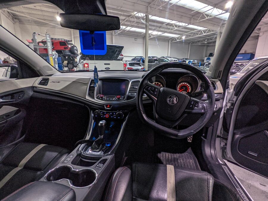 Right hand drive vehicle being unloaded